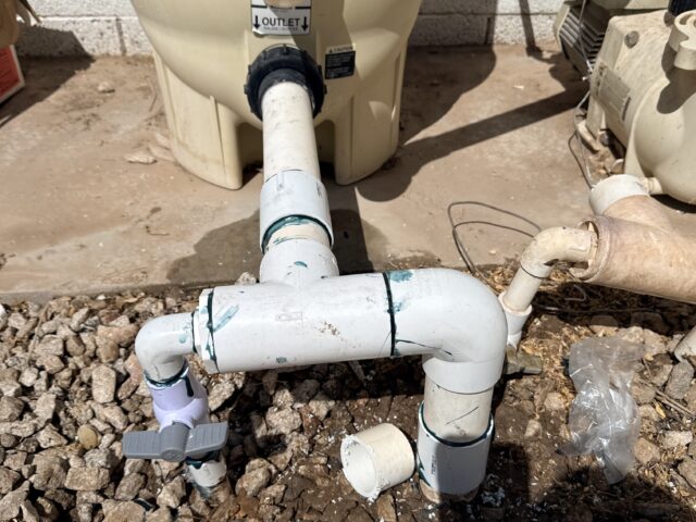 Replacement PVC piping installed at the pool pump after equipment repair in Somerton, Arizona