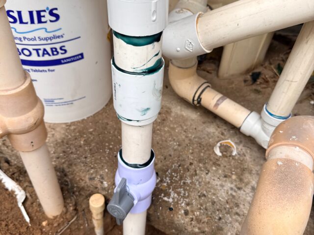 Repaired PVC plumbing and newly installed valve at pool equipment in Wellton, Arizona